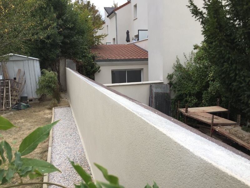 R&eacute;novation mur en pierre de meuli&egrave;re